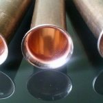 The ends of these copper pipes are flared: expanded to a specific shape and prepared for connection