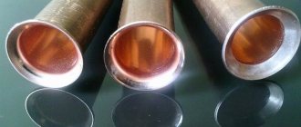 The ends of these copper pipes are flared: expanded to a specific shape and prepared for connection