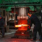 Forging carbon steel workpiece