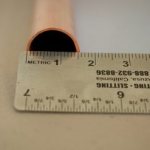 Determining the outer diameter of a copper pipe using a ruler