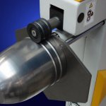 Operation of a seaming machine: applying a double round seam to a cylindrical workpiece