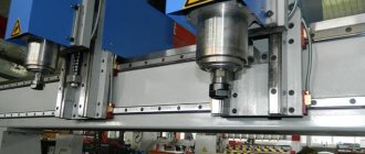 CNC milling machine spindles placed on a movable gantry