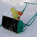 Chainsaw-based snow blower