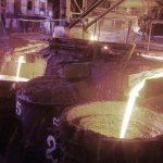 Release of cast iron from blast furnace into ladles